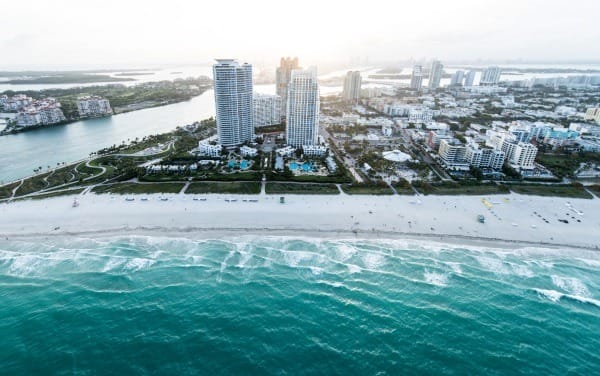 A city by the sea with white sandy beaches.