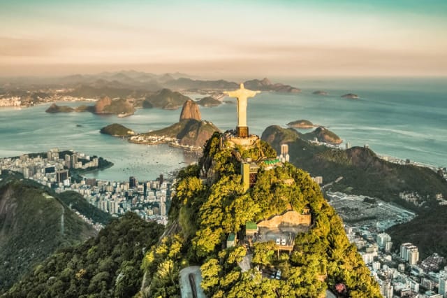 Christ the Redeemer in Rio de Janeiro, Brazil looking out to the sea and lands